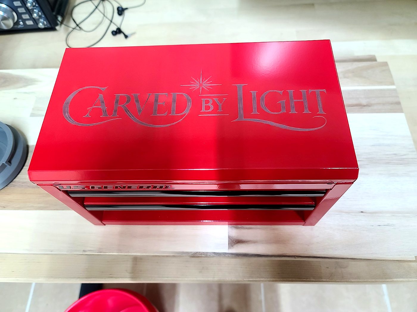 Metal toolbox personalized with the Carved By Light mark
